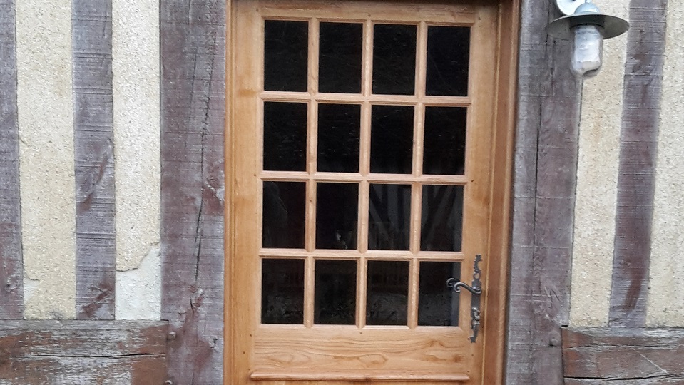 Porte en chêne petits carreaux